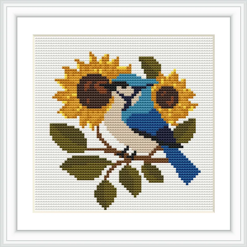 A blue bird perches on a branch surrounded by two large sunflowers and green leaves.
