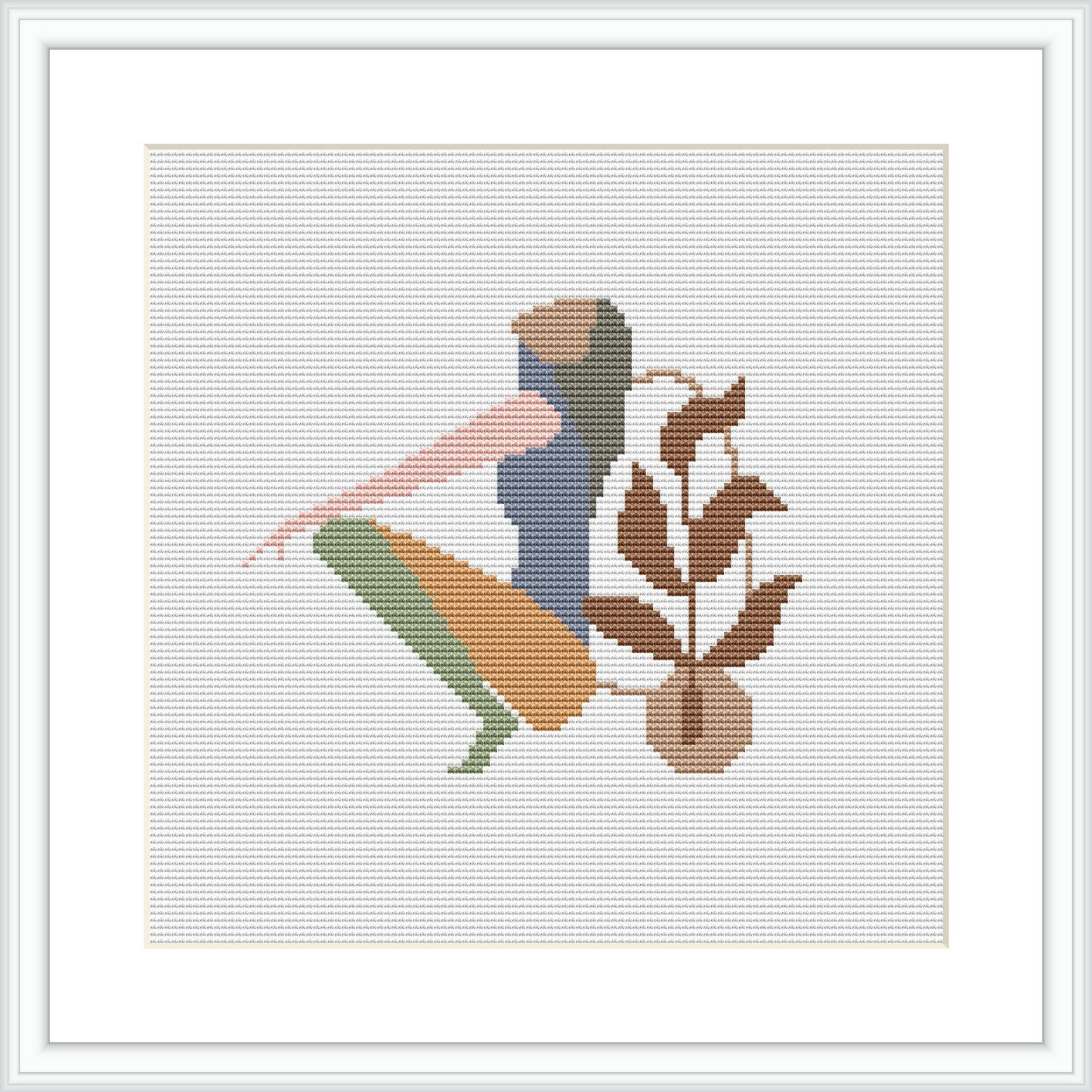 This image showcases a framed cross stitch pattern. It features an abstract silhouette of a woman with an earthy-toned leaf motif. The figure is centered within the square frame, set against a plain white background.