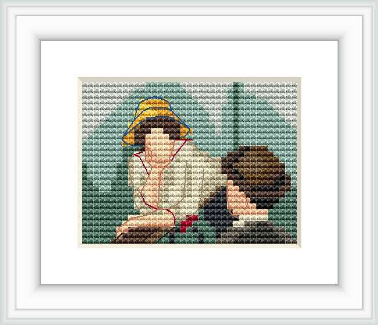 The cross stitch pattern depicts two figures, one prominently wearing a yellow hat, seated outdoors with greenery in the backdrop.