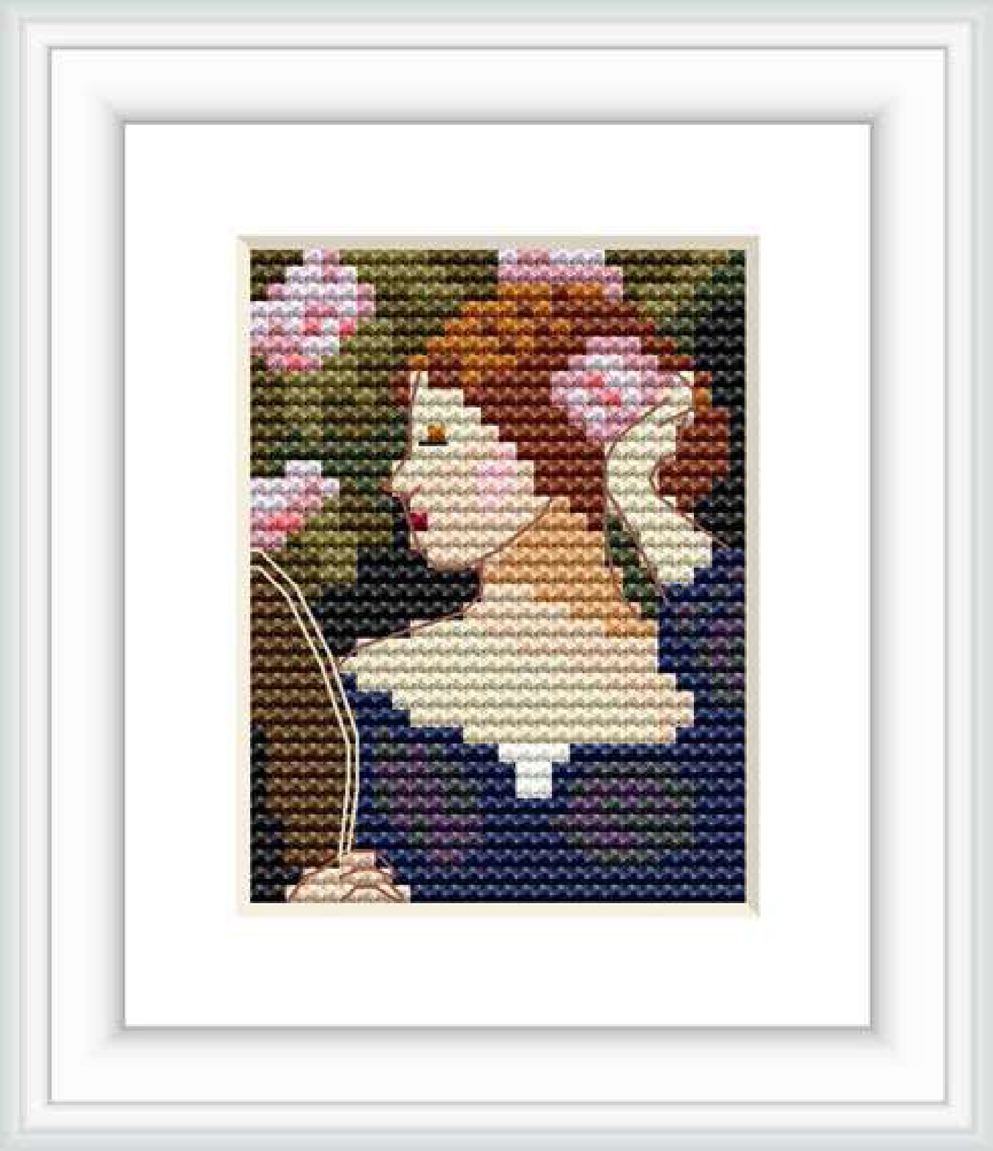 The cross stitch pattern features a profile portrait of a female figure against a muted, patterned background. The woman, with flushed cheeks and loosely styled hair, gazes to the side amidst blossoming flowers.