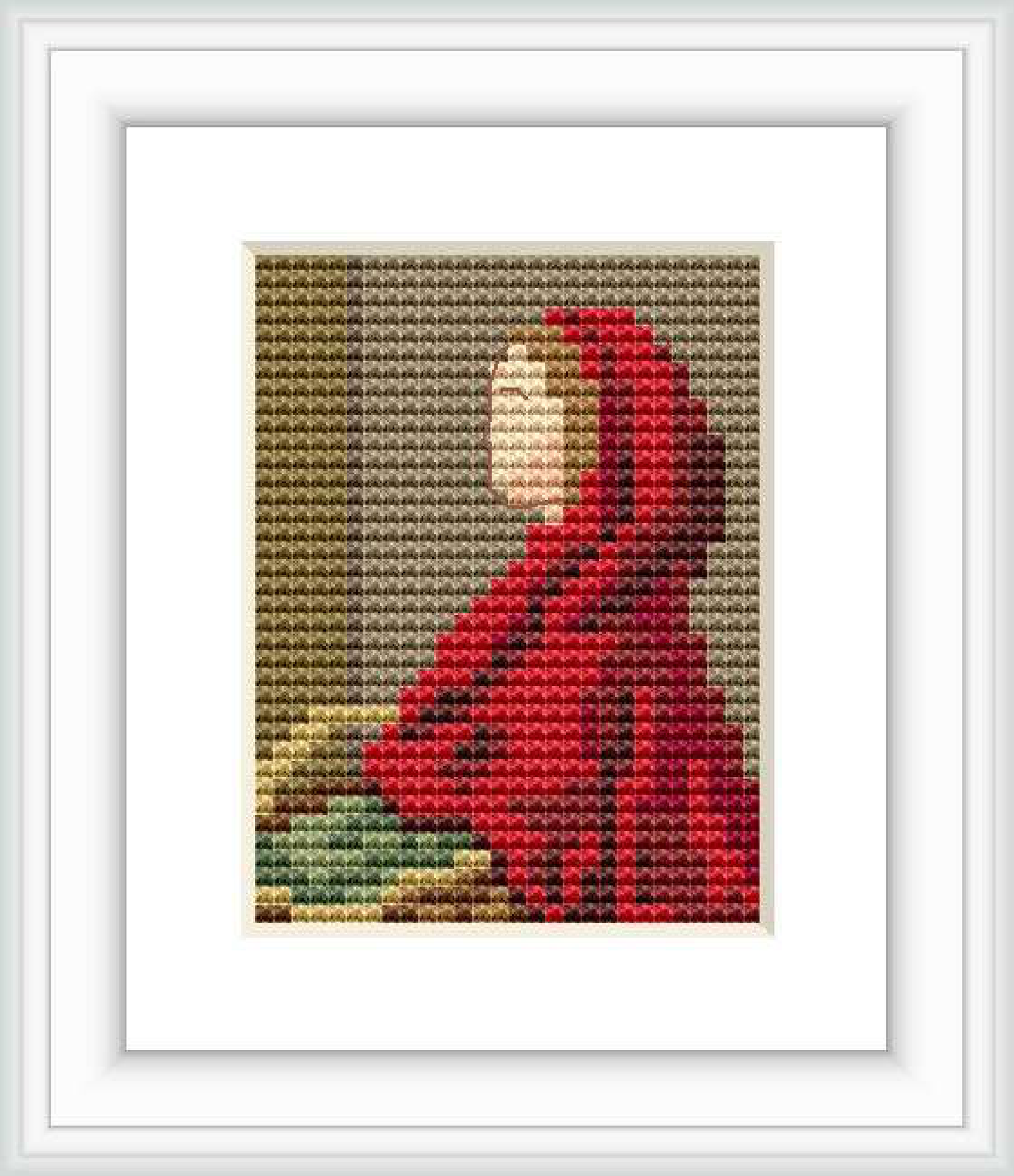 The image depicts a cross-stitch pattern of Red Riding Hood, a character in a fairytale. This particular representation references the work of Sir John Everett Millais. Positioned to the left, she is wrapped in a red hood and cloak, set against a neutral, dark background.