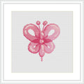 The image depicts a cross-stitched butterfly with a balloon-like appearance, centered on a neutral background.