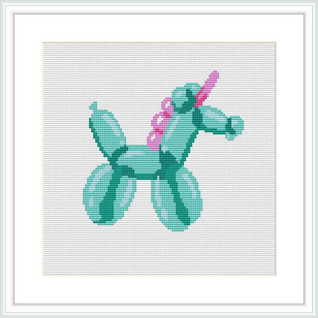 The image features a balloon animal shaped like a unicorn, crafted in shades of mint green and teal with a pink mane, centered within a square frame.