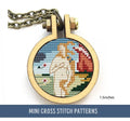 The image features a small cross stitch pattern of Venus, inspired by Botticelli’s painting. It is enclosed in a round wooden frame and attached to a chain. The background includes elements of water and sky.