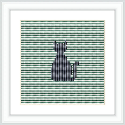 The image depicts a framed cross stitch pattern with a silhouette of a cat. The background is composed of horizontal green and white stripes. The cat is centered and defined by the absence of stripes, creating a contrasting striped silhouette.