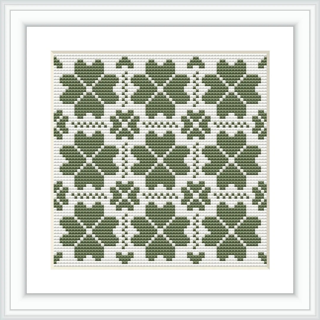 The image presents a framed cross stitch pattern consisting of multiple green clover motifs arranged in a symmetrical grid on a white background.