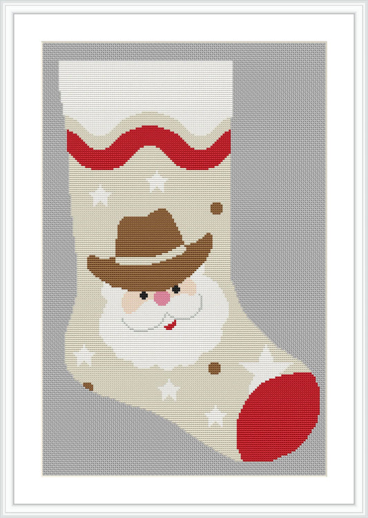 The image features a Christmas stocking design with Santa Claus depicted as a cowboy. Santa is wearing a brown cowboy hat, and his face is illustrated with a jolly expression. The stocking is beige with red and white decorative elements, including stars and a wavy red band at the top.