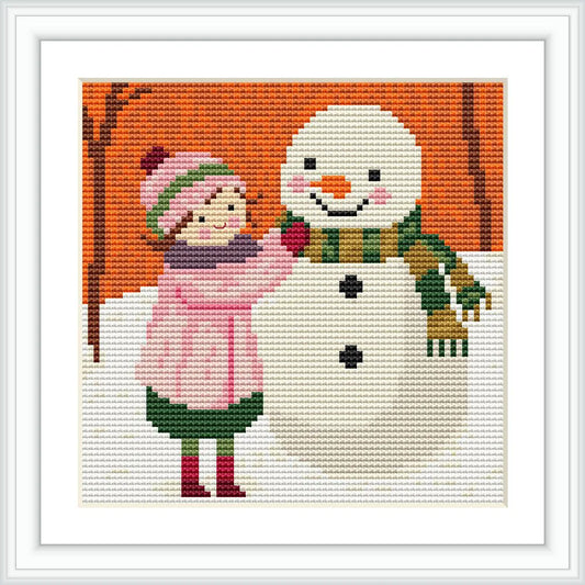 A girl dressed in pink winter clothes and a snowman with a green scarf are depicted in a snowy outdoor setting with orange background and brown tree branches.