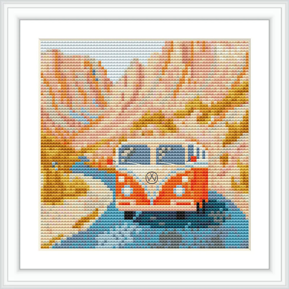 A classic orange VW bus driving through a scenic desert landscape with mountains and a winding blue road.