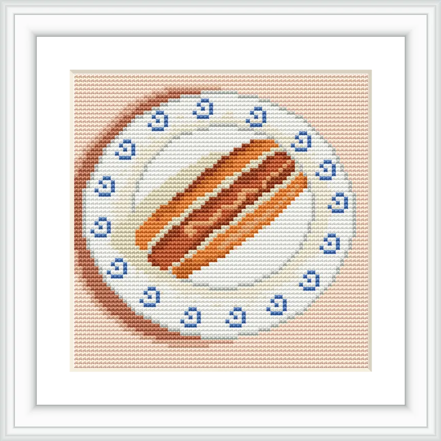 The image depicts a realistic cross stitch pattern of a hot dog placed on a white plate with blue decorative patterns, set against a pale peach background.