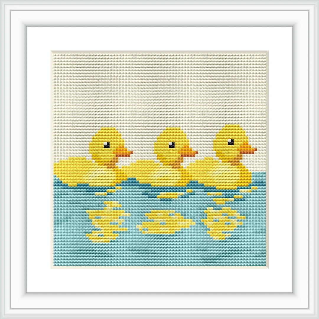 The image features three yellow ducklings with reflections below them, swimming on a blue water surface. They are evenly spaced and oriented in the same direction.