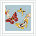 The image features a group of butterflies in varying colors, flying against a pastel blue background. The butterflies are positioned dynamically with their wings spread gracefully.