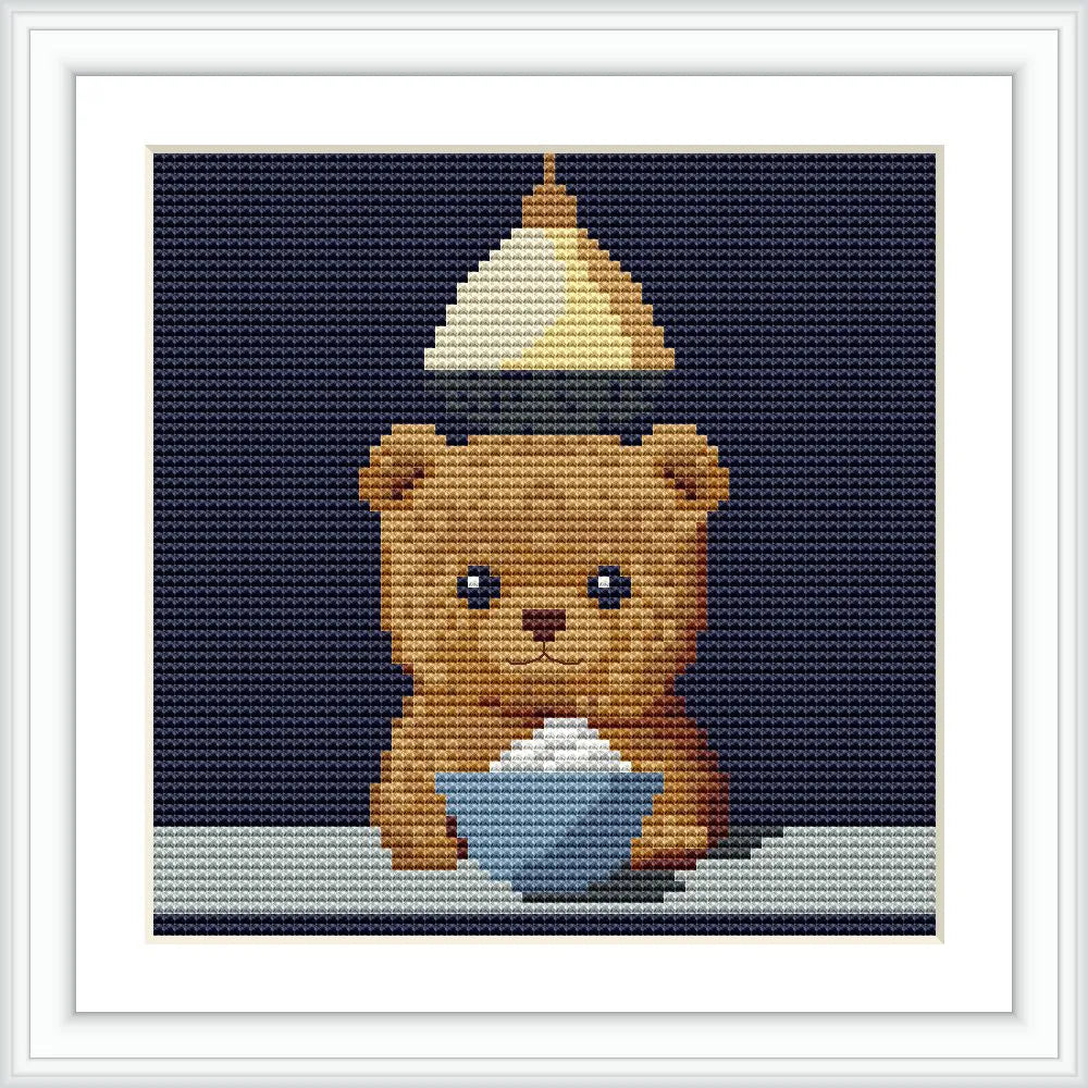 The image shows a cute bear with a bowl and a softly glowing light above, set against a dark background.