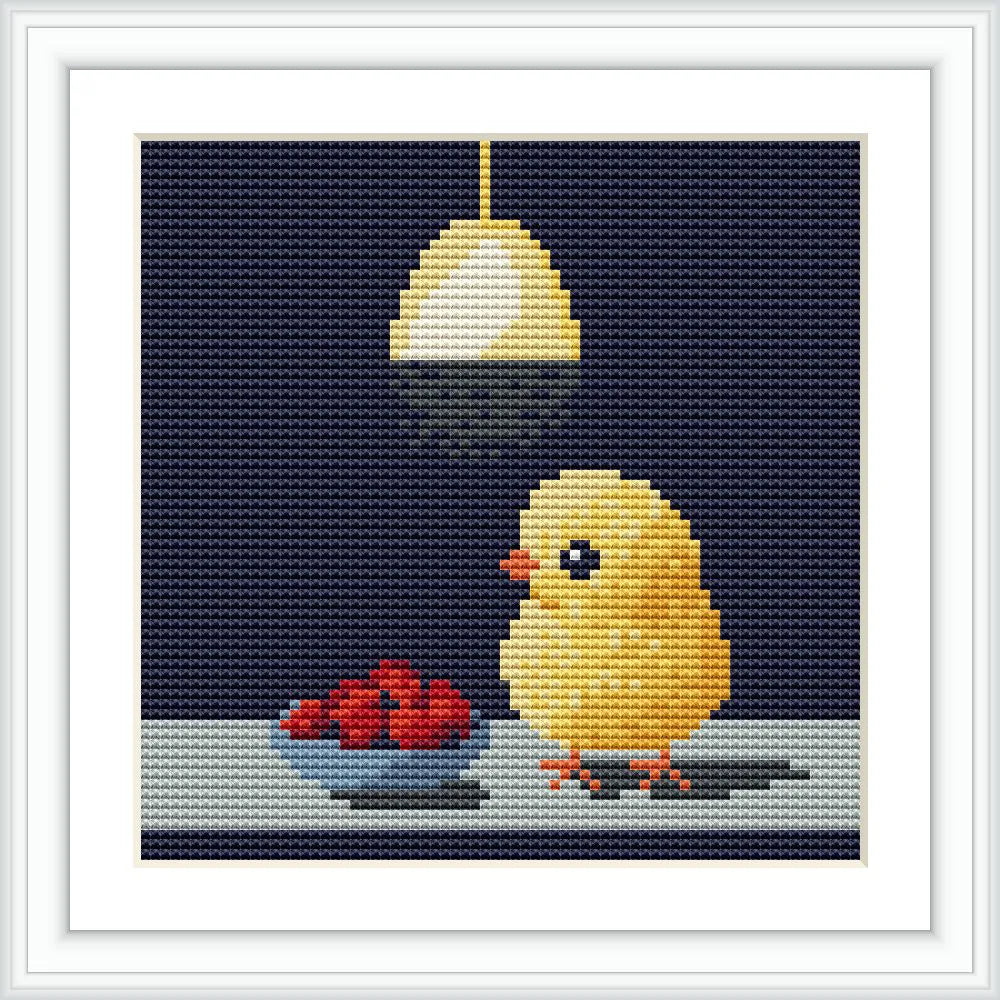 The image shows a cute yellow chick standing on a table under a hanging light. Next to the chick is a bowl filled with red cherries. The background is a dark navy blue, adding depth to the scene.