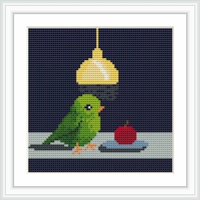 A green bird is perched on a surface next to a red apple, illuminated by a yellow hanging lamp against a dark blue background.