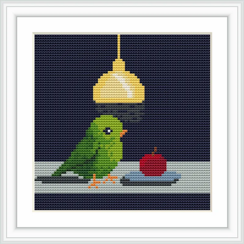 A green bird is perched on a surface next to a red apple, illuminated by a yellow hanging lamp against a dark blue background.