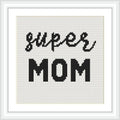 The image displays a cross stitch pattern with the words 'super mom' in black thread on a white background, framed elegantly.