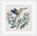 A beautifully detailed cross stitch depicts a hummingbird in mid-flight among pink flowers and leafy branches.