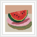 A slice of watermelon with green rind and red flesh is placed on top of two colorful plates on a beige background.