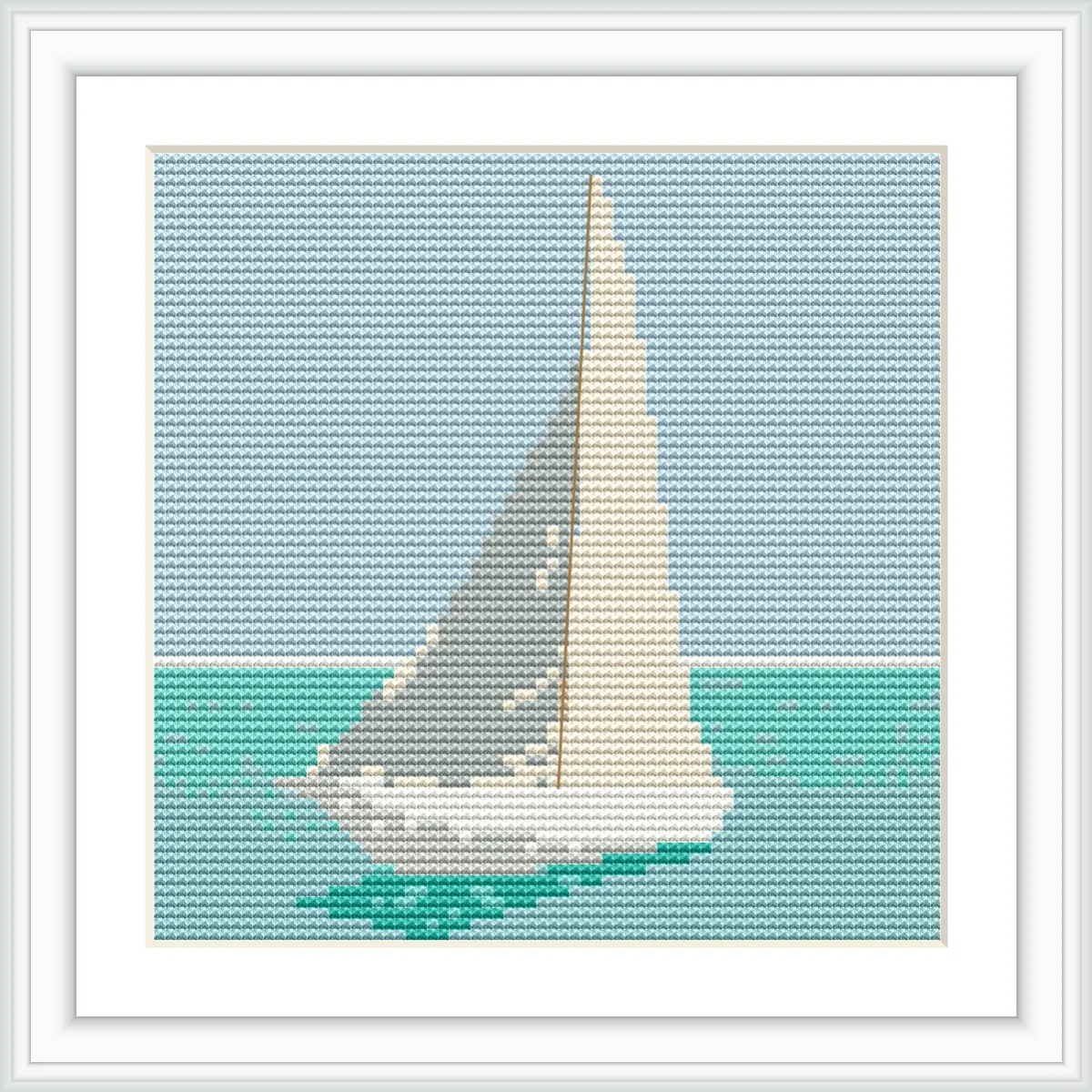 A single sailboat with a grey and white sail is shown on calm turquoise water with a pale blue sky in the background.