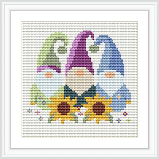 The image depicts three gnomes standing side by side. Each gnome has a differently colored hat: green, purple, and blue. Behind the gnomes, there are two large sunflowers, and small colorful flowers are scattered around.