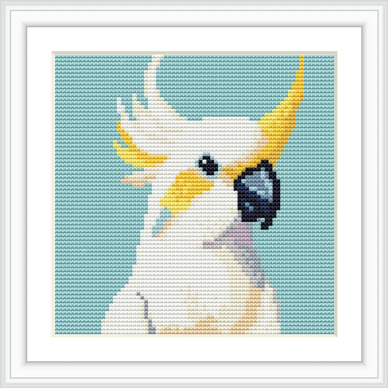 A white cockatoo is centered against a soft blue background. Its beak is black, and it features vibrant yellow feathers on its crest and sides.