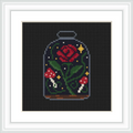 The image displays a red rose with green leaves encapsulated in a glass jar. Surrounding the rose are small glowing stars and a couple of red mushrooms with white spots, placed on a dark background.