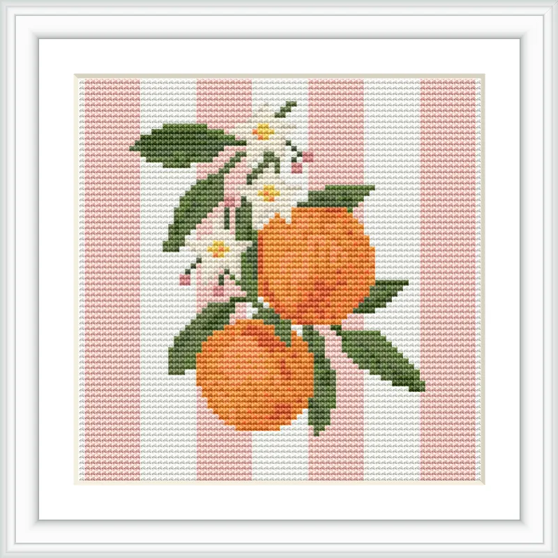 The image features two ripe oranges with lush green leaves and small white flowers, all set against vertical orange stripes.