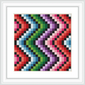 The image depicts a colorful geometric zig zag pattern, symmetrically arranged with vibrant colors such as red, green, purple, pink, and black, creating a striking visual effect.