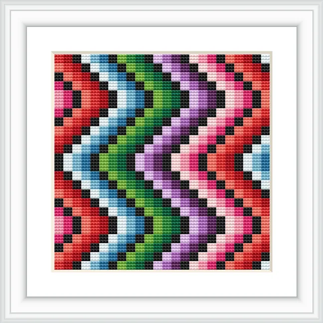 The image depicts a colorful geometric zig zag pattern, symmetrically arranged with vibrant colors such as red, green, purple, pink, and black, creating a striking visual effect.