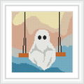 A small ghost sits on a swing suspended by black ropes, with a backdrop of blue water and a peach sky.