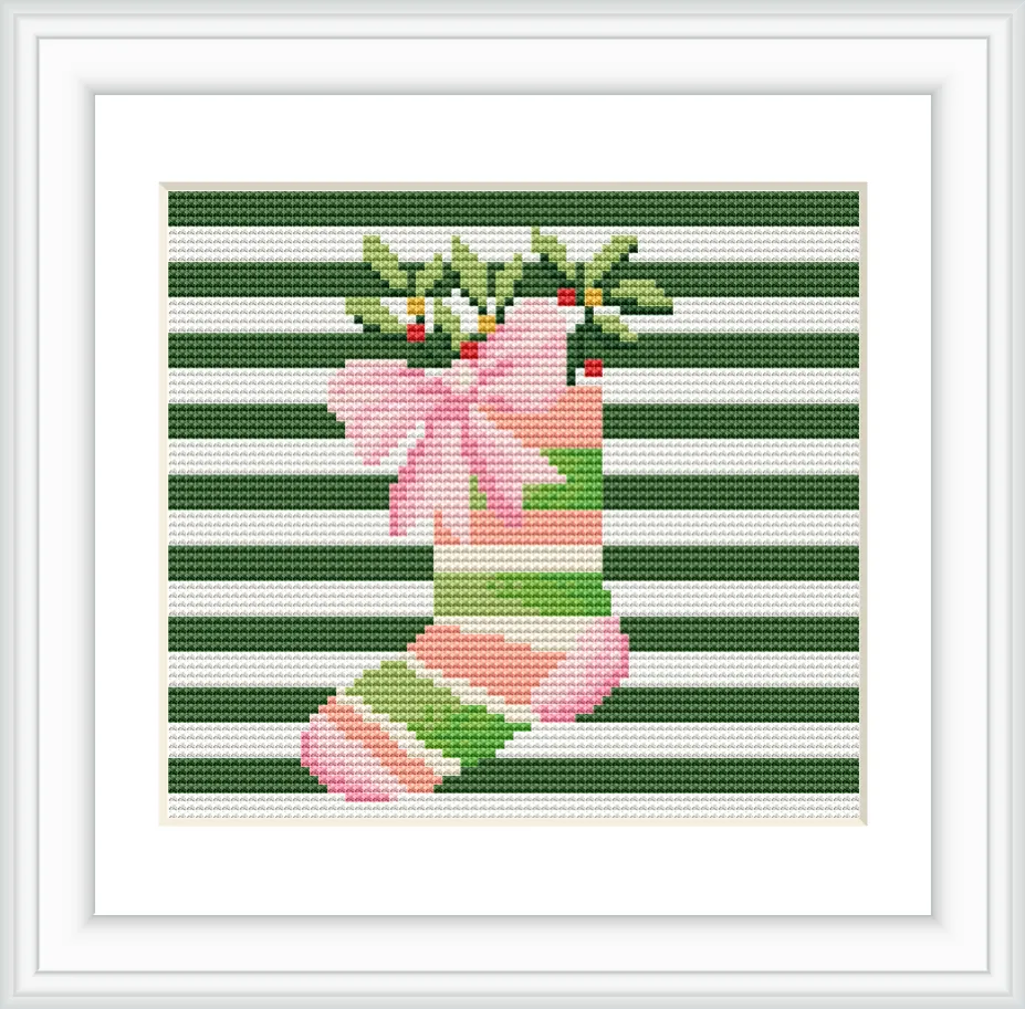 A green Christmas stocking with pink and green stripes, decorated with a pink bow and holly leaves and berries, against a background of horizontal green and white stripes.