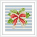 The image features a cross stitch pattern with a red and cream bow at the center, adorned with green holly leaves and berries on a blue striped background.