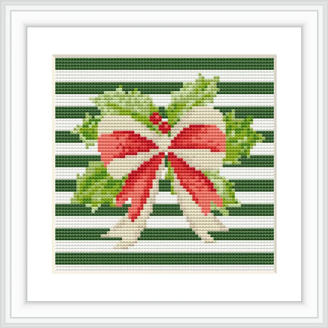 The cross stitch pattern features a large green and red bow with holly leaves and berries. It is centered against a background of horizontal green and white stripes.