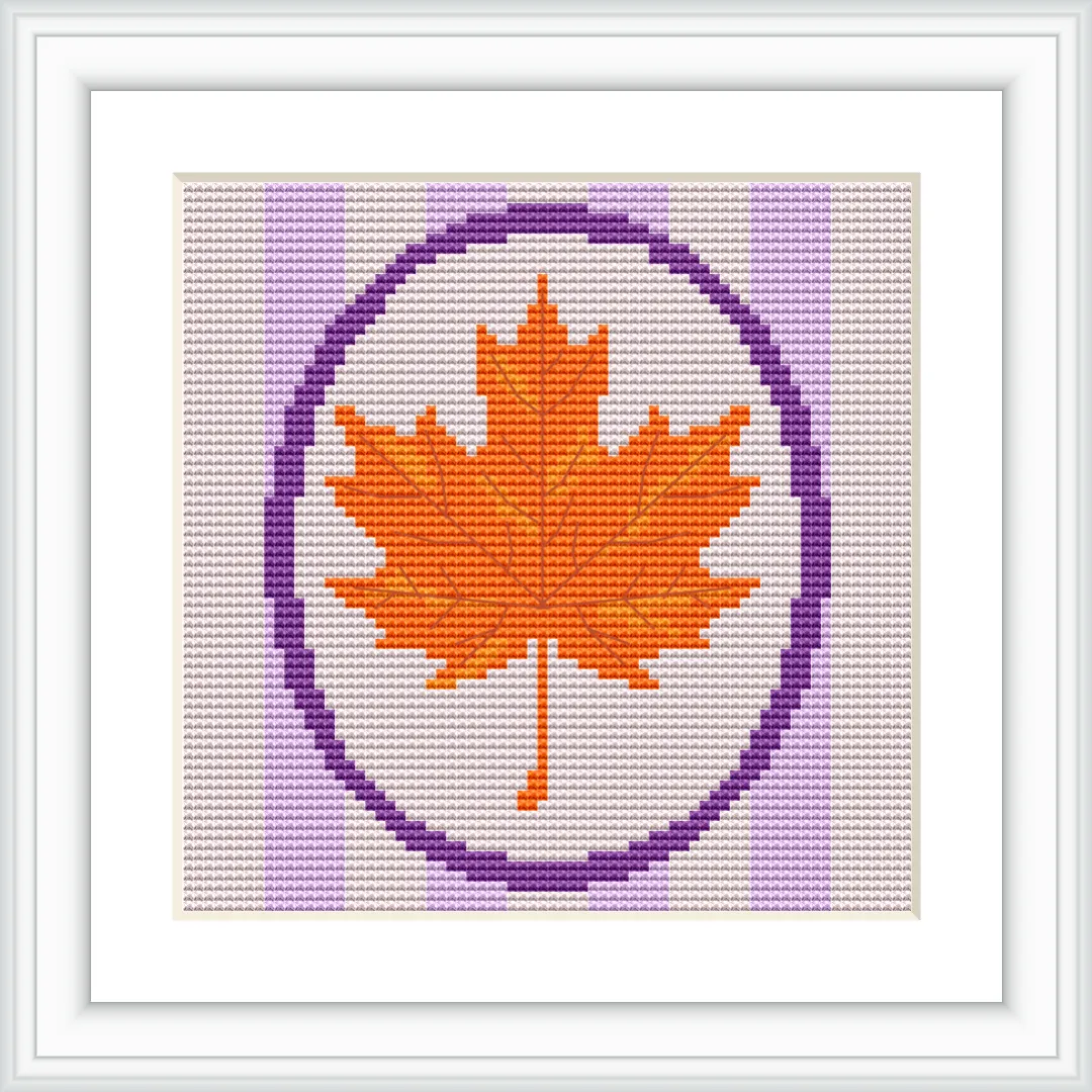 The image features an orange maple leaf centered within a purple oval border. Purple and white stripes form the backdrop, creating a harmonious and balanced composition.