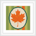 The image shows an orange maple leaf centered within an oval frame set against a striped green and orange background.