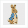 A brown bunny wearing a blue jacket stands against a white background.