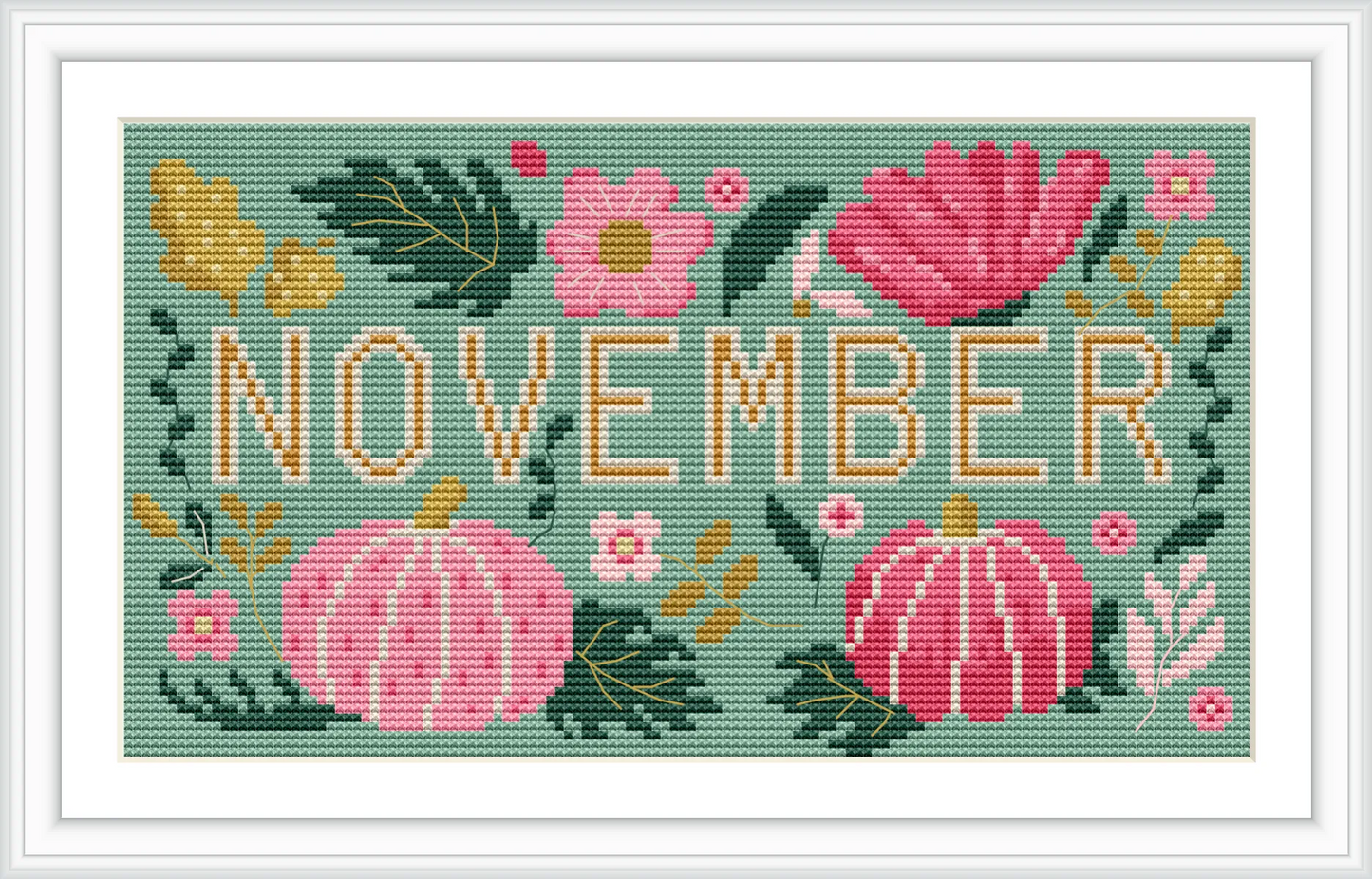 The image displays the word 'November' surrounded by pink pumpkins and vibrant flowers, all set against a green background with scattered leaves.