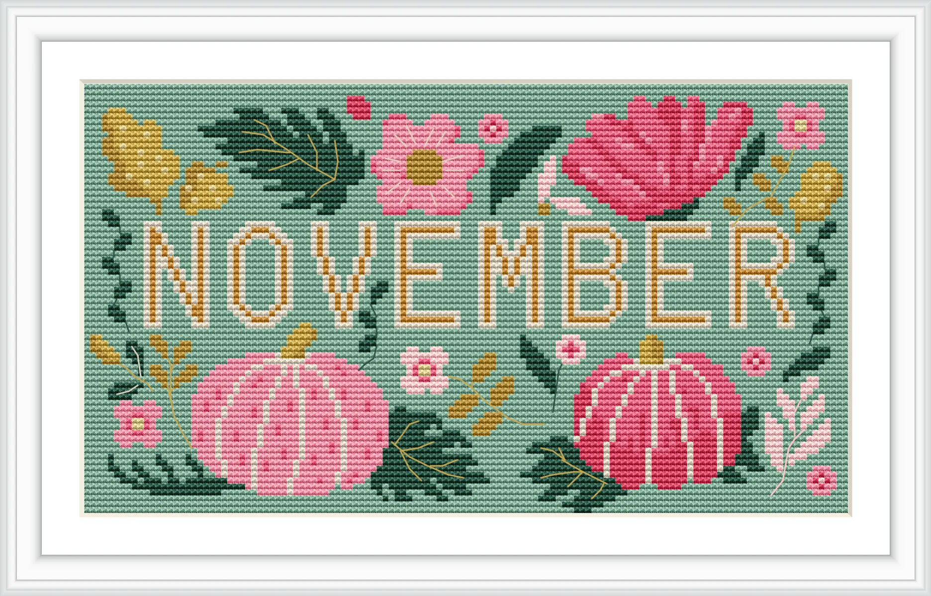The image displays the word 'November' surrounded by pink pumpkins and vibrant flowers, all set against a green background with scattered leaves.