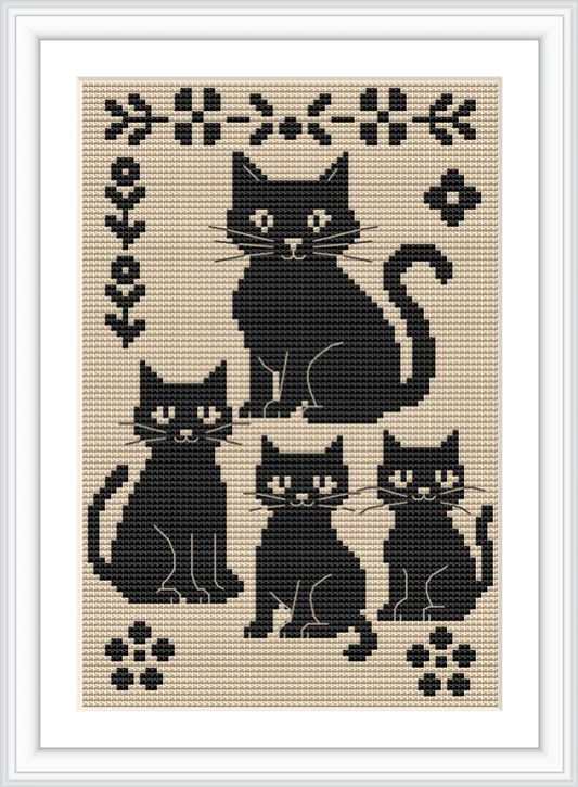 The image shows four black cats in a seated position on a beige background, framed by floral and geometric motifs in a cross pattern.