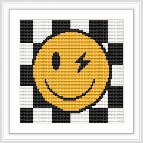 A winking happy face in yellow is placed on a black and white checkerboard background.