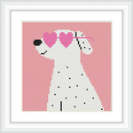 A white dog with black spots is wearing pink heart-shaped sunglasses against a pink background.