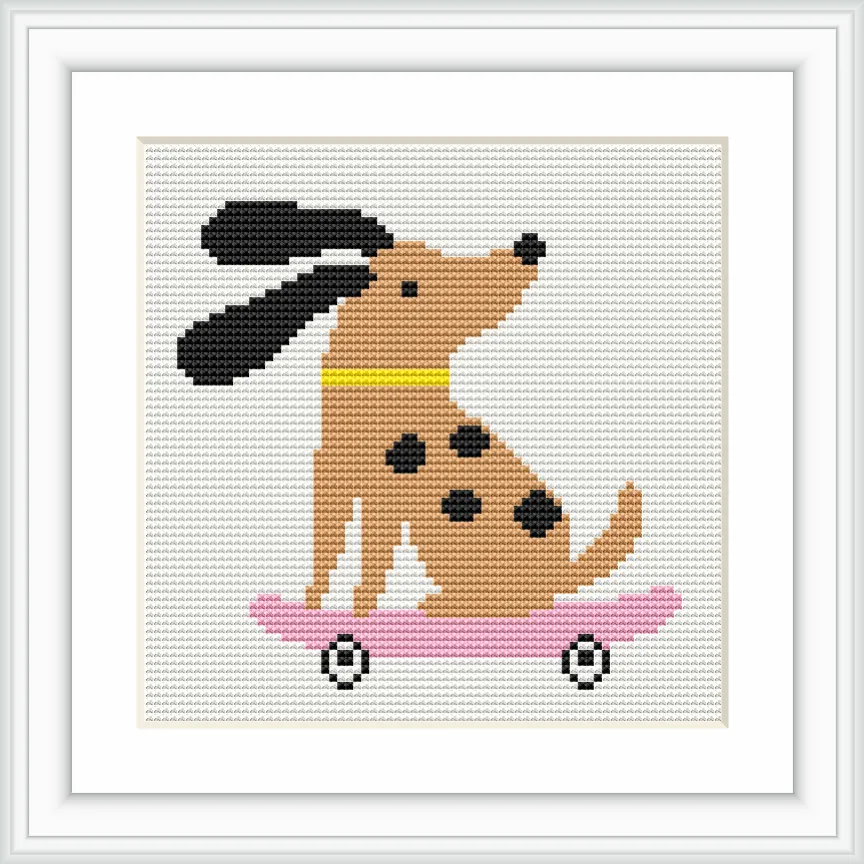 The scene depicts a cartoon-style brown dog with black ears and spots riding a pink skateboard. The dog is centered within a white, framed cross-stitch pattern.