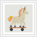 The image features a unicorn with an orange mane and tail, decorated with small star patterns. It stands on a skateboard with black wheels and an orange board.