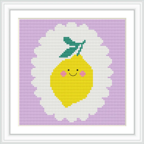 A cross stitch of a smiling lemon with pink cheeks and green leaves, centered on a white scalloped background, set against a lavender square.