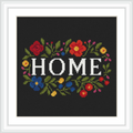 The image features the word 'HOME' in white capital letters, surrounded by a colorful array of red, yellow, blue, and green floral designs on a dark background, all enclosed within a white frame.