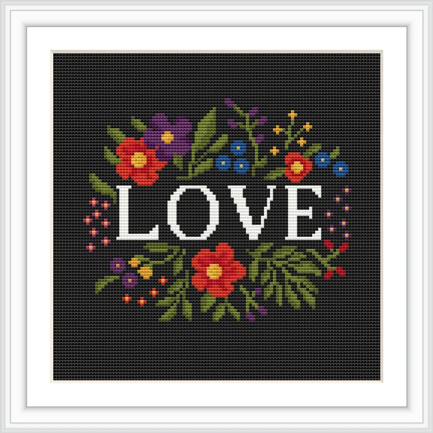 The image depicts the word 'LOVE' surrounded by an array of colorful flowers and leaves, set against a dark background.