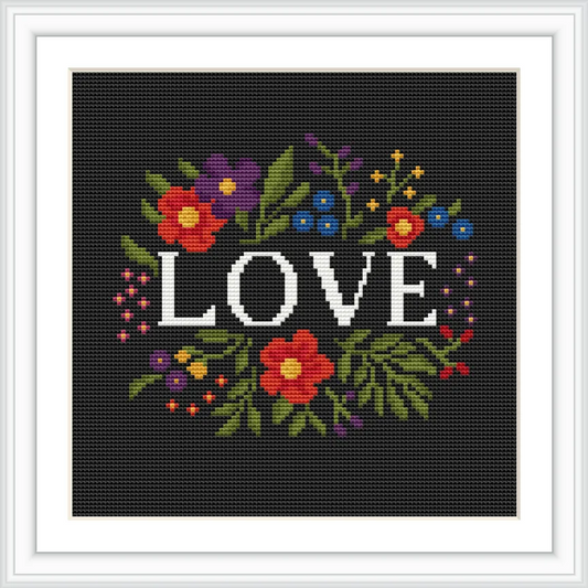 The image depicts the word 'LOVE' surrounded by an array of colorful flowers and leaves, set against a dark background.