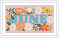 The image depicts the word 'June' in large blue letters surrounded by a variety of colorful flowers including daisies, roses, and poppies on a pink background.