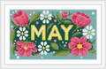 The image shows vibrant pink and white flowers surrounding bold yellow letters spelling 'MAY', set against a blue background.